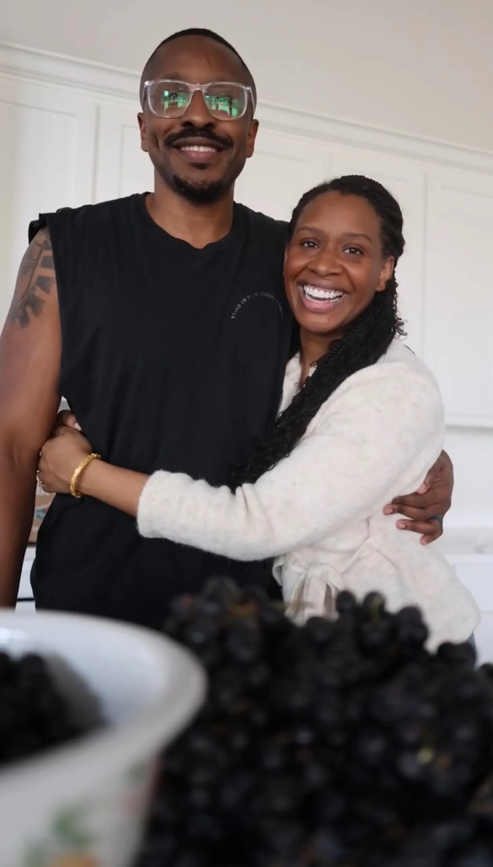 Janiece Okpobiri with her husband in their kitchen